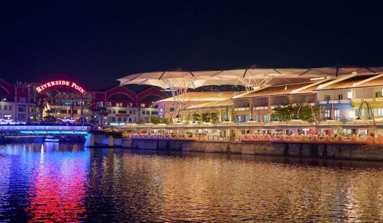 Night view of Riverside Point with colorful reflections over water
CK Seng/Pexels