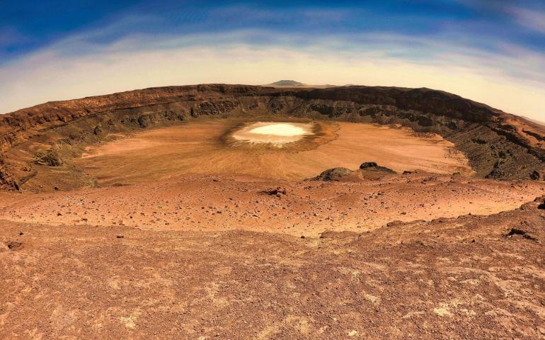 Discover the stunning Al Wahbah Crater in the vast desert of Saudi Arabia