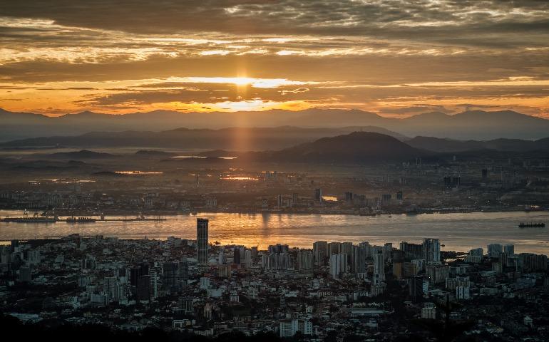 Stunning sunset skyline view from Bukit Bendera, Penang.