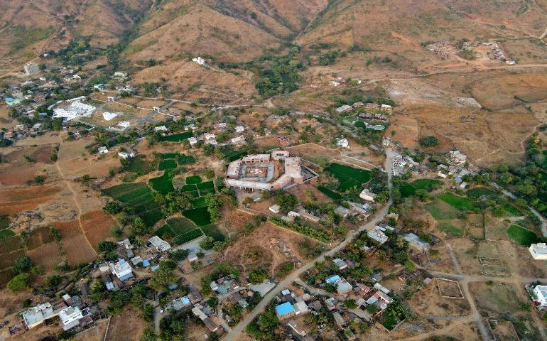 Monsoon Palace surrounded by lush landscapes in Udaipur.