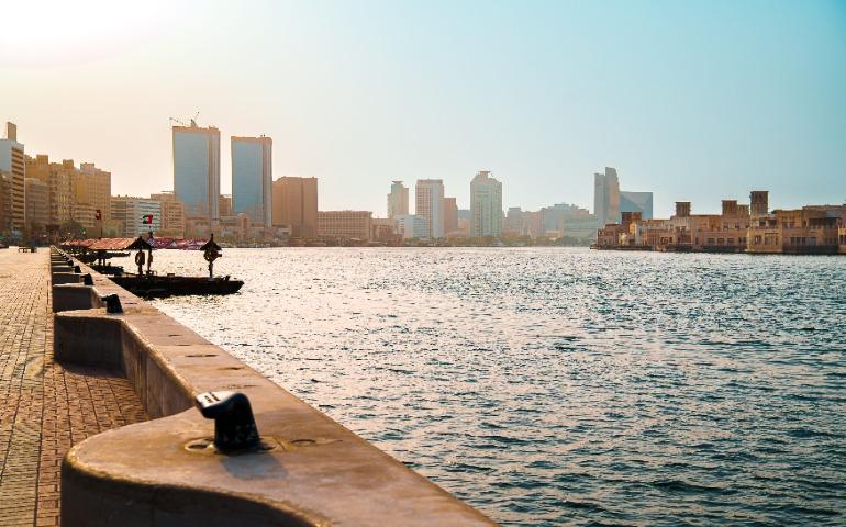 View of Dubai Creek with skyline