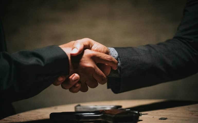 Two people shaking hands
