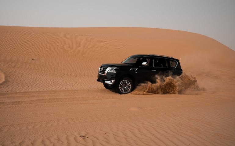 Dune bashing on a 4x4 in a desert in Abu Dhabi