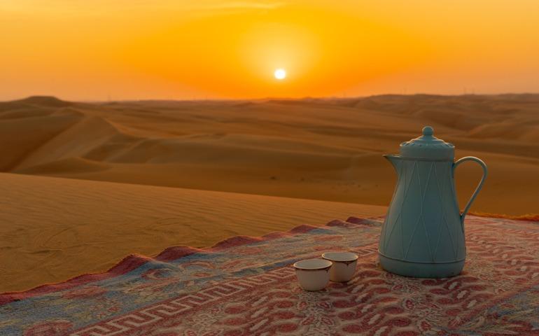 Relaxing at Abu Dhabi desert during golden hours with kahwa coffee during winter time