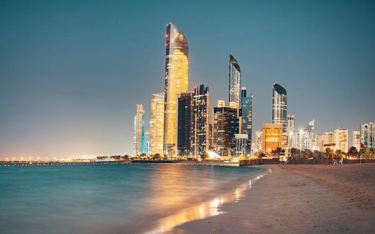 View of Abu Dhabi city from the Corniche at night