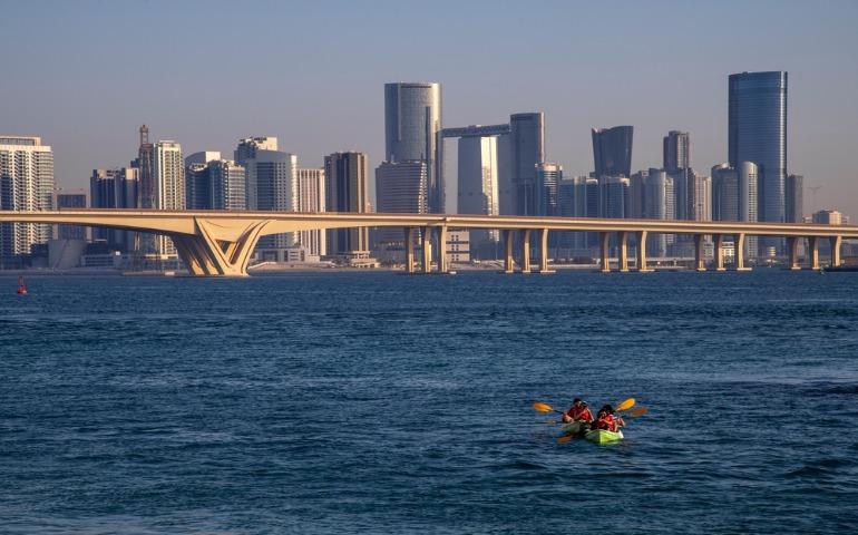 Tourists kayaking over the waters of Abu Dhabi