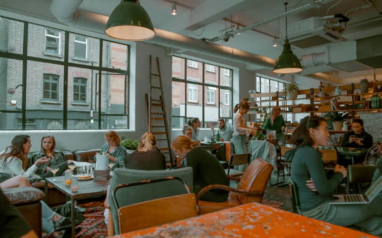 People enjoying good food at a restaurant