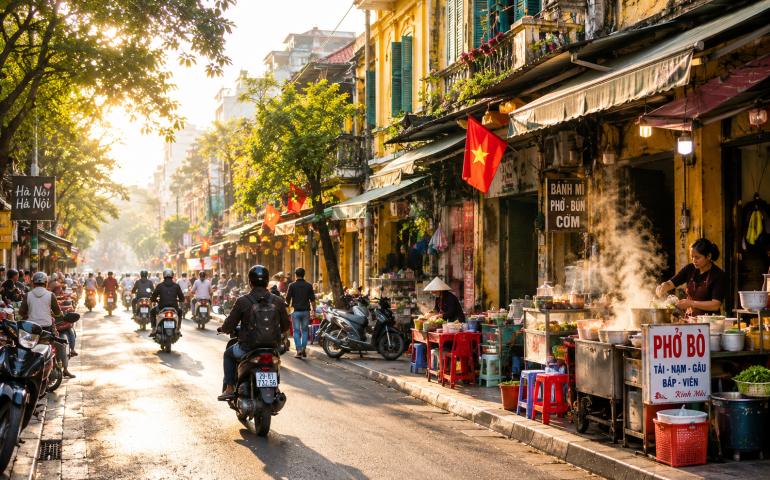 Busy Hanoi street after sunrise