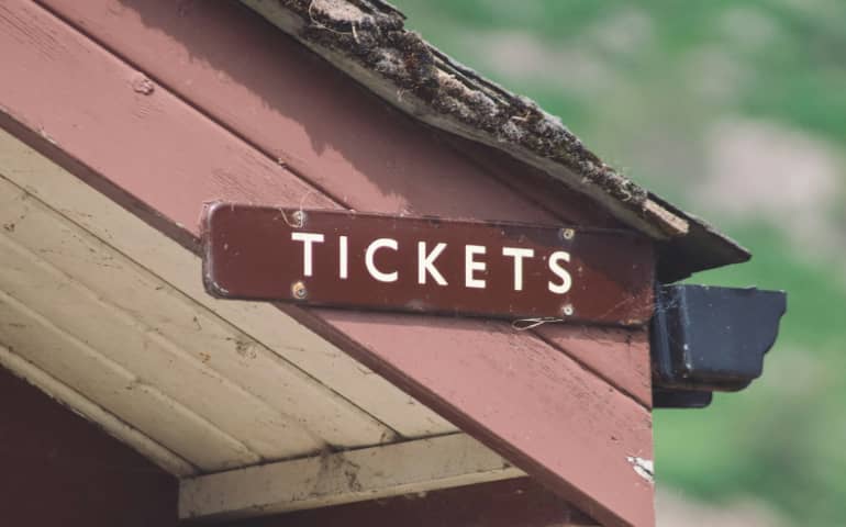 A ticket sign on a hut

