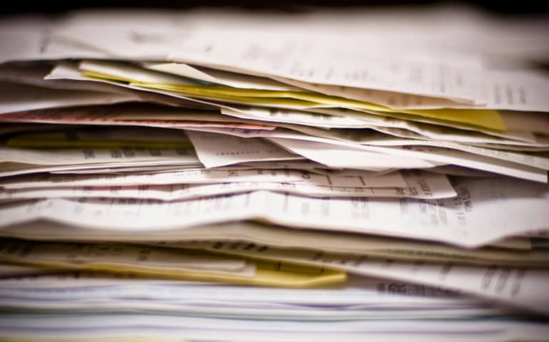 A stack of documents piled up
