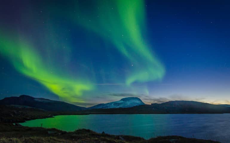 Picture of the polar lights over this little lake in Sweden