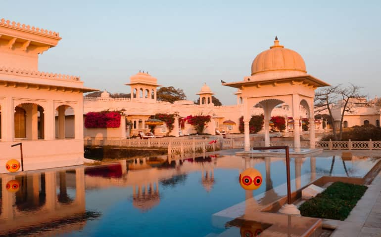 A large pool in the middle of the villa