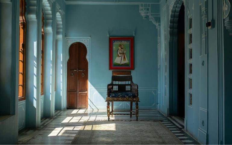 The City Palace blue room with elegant hallway and arched windows
Image Credit - Laura Lezman/Unsplash