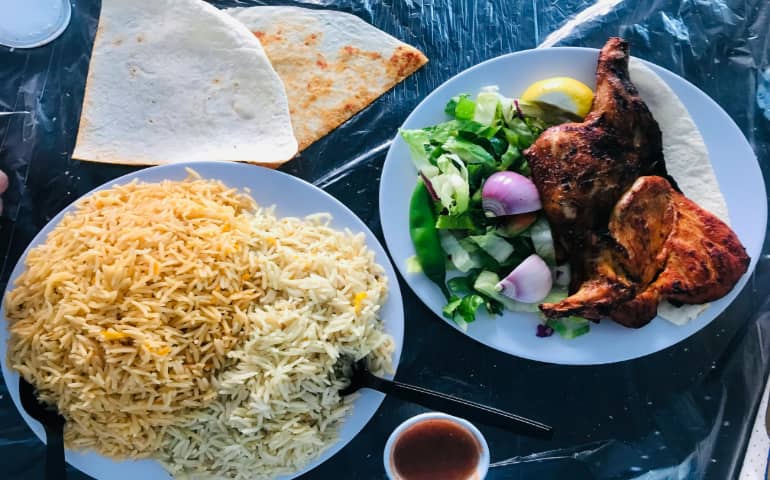 Roasted chicken with rice and salad
