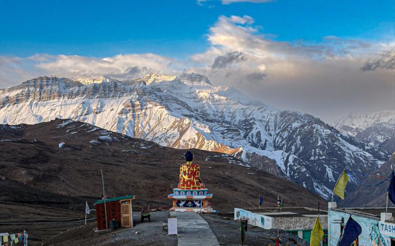 Scenic view of a vibrant Buddhist Stupa amidst snow-capped mountains in Spiti Valley, Himachal Pradesh.
Image Credit - Almas/Pexels