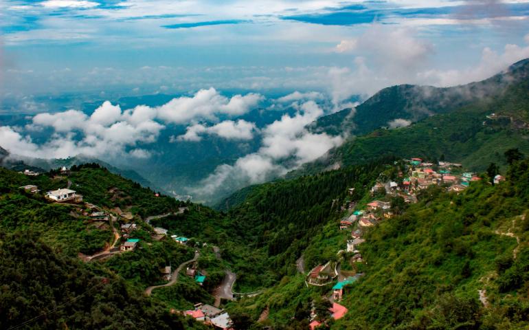 Captivating view of lush mountains and clouds in Mussoorie, India, showcasing natural beauty.
Image Credit - Being.the.traveller/Pexels