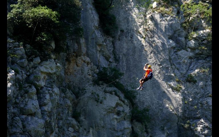 A daring mountaineer ziplining across Rishikesh, showcasing adventure and excitement.
Image Credit - Branimir Klaric/Pexels