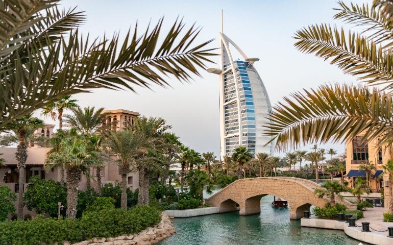 View of Burj Al Arab with surrounding palm trees and bridge in Dubai, UAE
Image Credit: Diego F. Parra/Pexels
