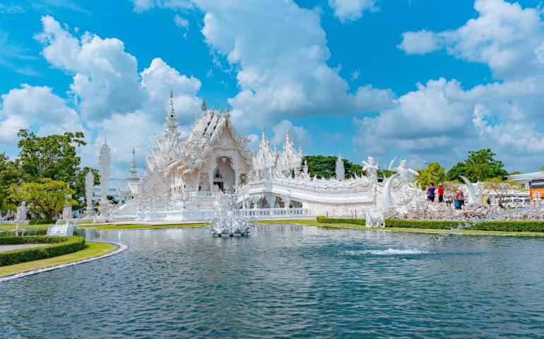 The iconic White Temple in Thailand captured on a sunny day with clear reflections
Image Credit: Gije Cho/Pexels