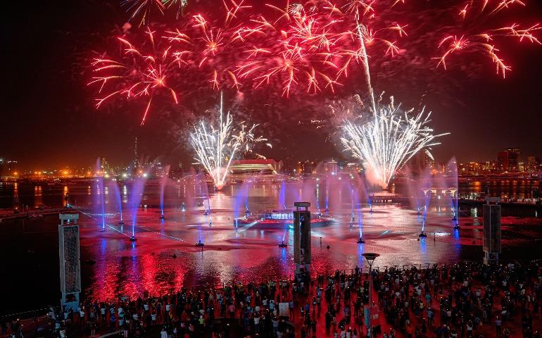 Fireworks display illuminating the night sky at a city festival.
Image Credit: Denys Gromov/Pexels