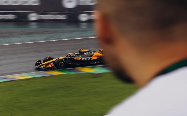 A high-speed Formula 1 car races around a track, captured in motion.
Image Credit: Jonathan Borba/Pexels