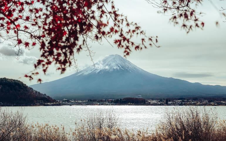Autumn view of Mount Fuji with red leaves and reflections on the lake
Image Credit: Lorenzo Castellino/Pexels