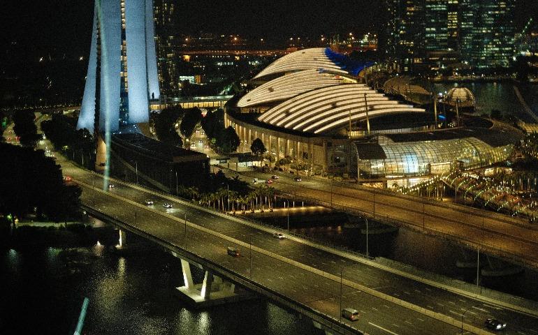 Dramatic night view of Marina Bay Sands and Helix Bridge in Singapore
Image Credit: Namzy/Pexels