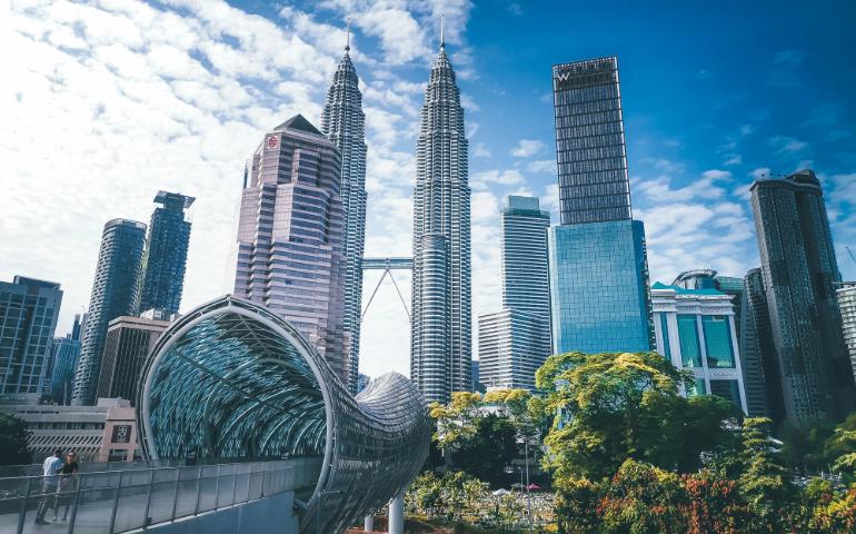 Stunning view of the iconic Petronas Towers and surrounding skyscrapers in Malaysia during the day.
Image Credit: Pok Rie/Pexels
