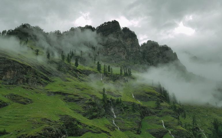 A serene view of a mist-covered mountain in Manali, India, showcasing lush greenery and trees.
Image Credit - Saif71.com/Pexels