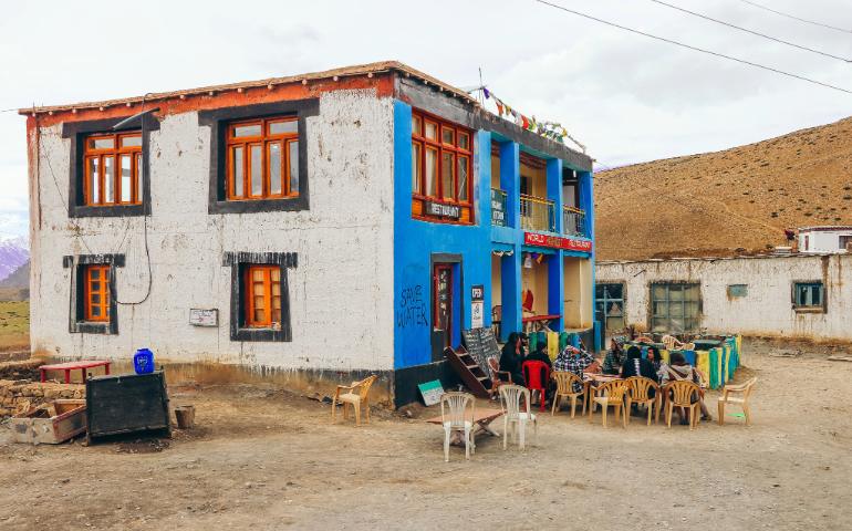 A vibrant cafe in Komic Village, Himachal Pradesh, set amidst the serene Spiti Valley landscape.
Image Credit - Sakshi Patwa/Pexels