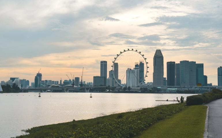 A breathtaking view of Singapore's skyline at dusk featuring the iconic Ferris wheel.
Image Credit: Shlok Rana/Pexels