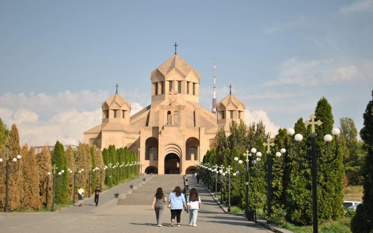 A group walks towards Holy Cross Cathedral, Yerevan, Armenia.
Image Credit: Valeria Drozdova/Pexels