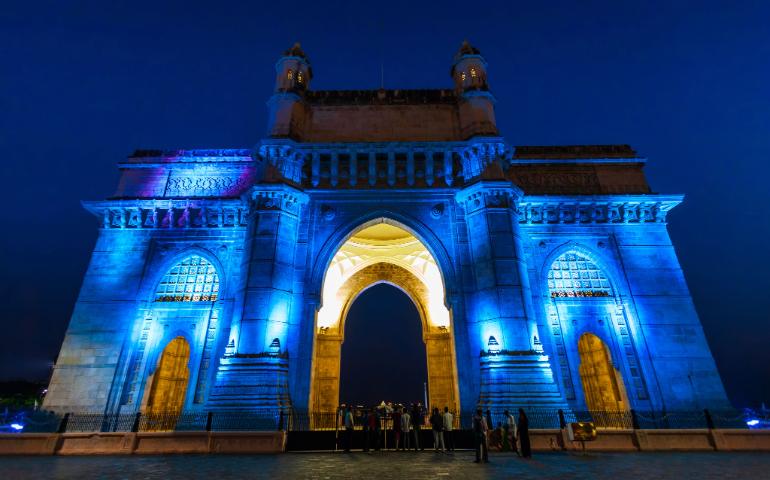 An arch monument of Gateway if India at Night.
Image Credit - saiko3p/Shutterstock