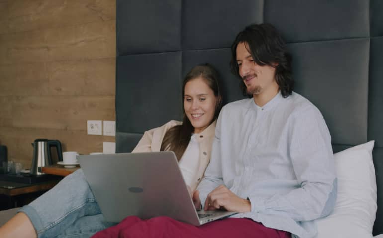 Couple chilling in a hotel room
