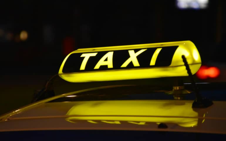 Taxi with a yellow light
