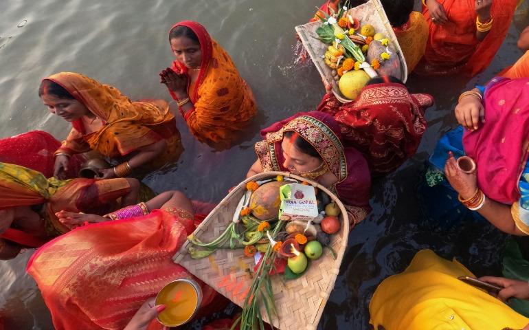 Women performing the puja
