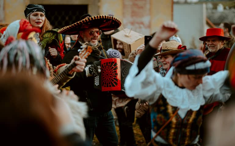 Men and women enjoying the carnival in Czechia
