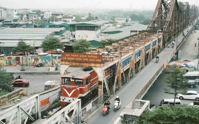 A train passing from the road in Hanoi