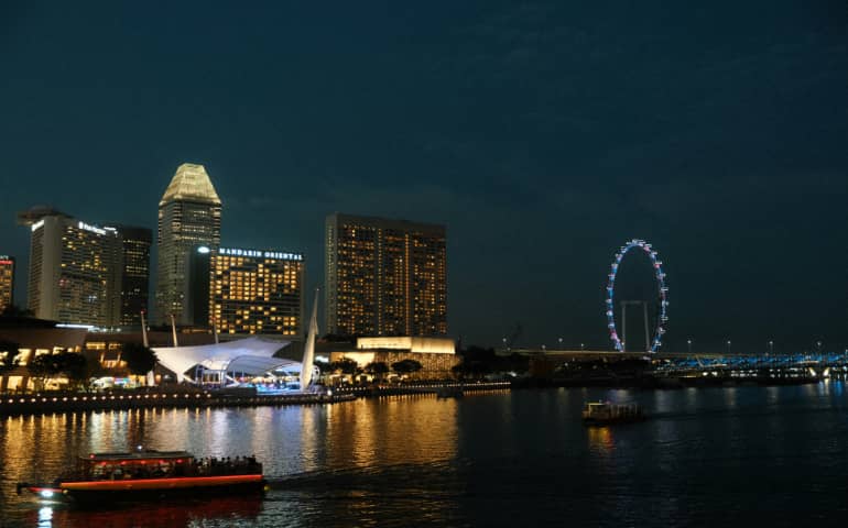 A river cruise at night in Singapore
