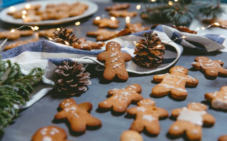 Delicious brown cookies and Christmas decorations at the table