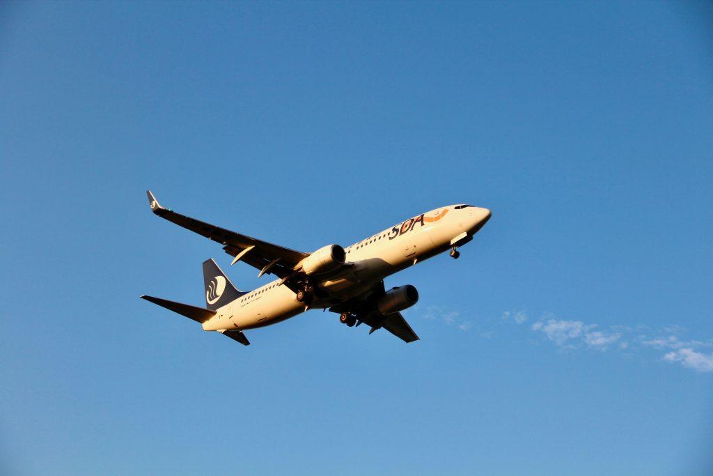 Airplane flying against a clear blue sky
Image Credit: Anderson Wei/Pexels