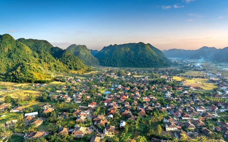 View of a rural village surrounded by verdant mountains, Vietnam
Image Credit: Quang Nguyen Vinh/Pexels