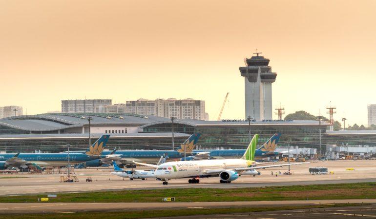 Airplanes parked on a runway under a dramatic golden sunset sky
Image Credit: Quang Nguyen Vinh/Pexels