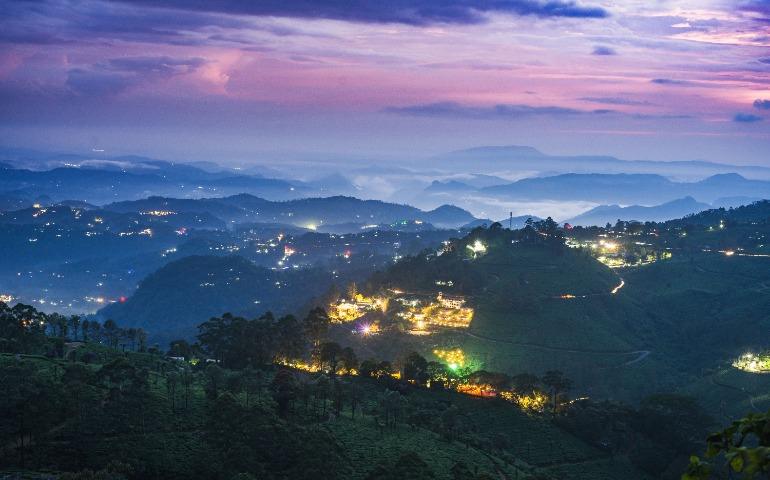 Stunning twilight landscape of illuminated hills in Munnar, Kerala, India
Image Credit: Iqbal farooz/Pexels