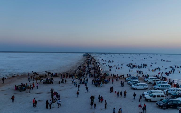 People walking towards the White Desert 

