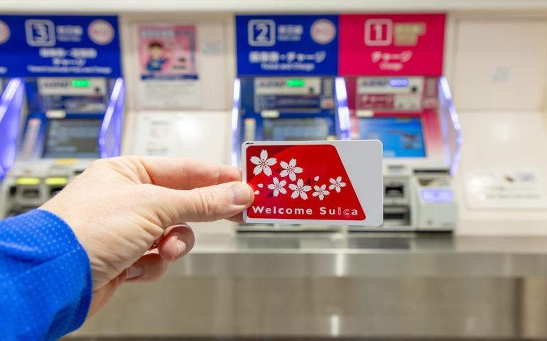 A traveller with Japan's Suica transport card
