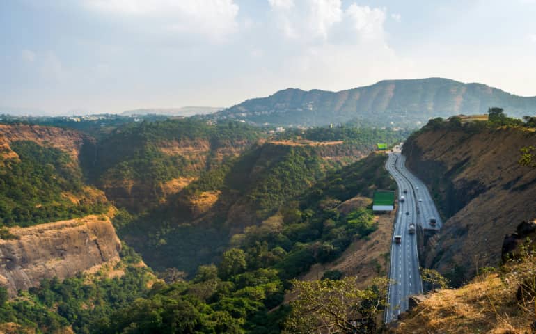 Beautiful highway among the hills and valleys as viewed from Rajmachi Garden in Khandala 
