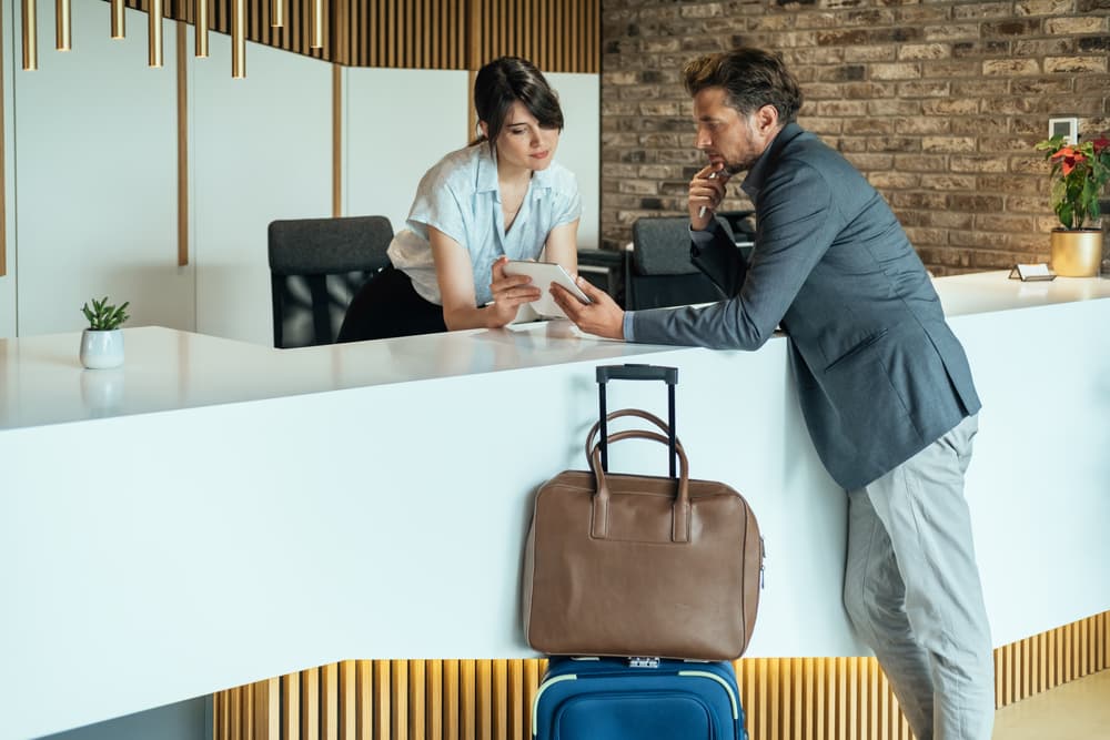 Traveller checking hotel prices and inclusions