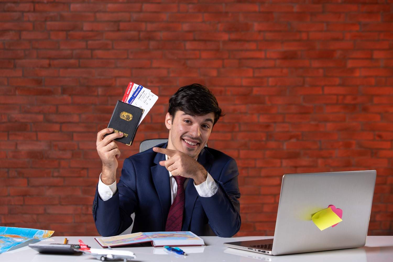 Business traveller holding flight tickets and passport